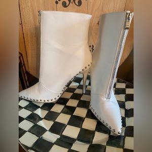 White with Silver Stud boots…silver zip front. Never worn
